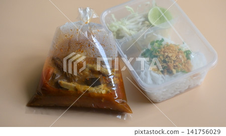 rice vermicelli with northern thai curry sauce in plastic bag rice vermicelli with northern thai curry sauce in plastic bag 141756029