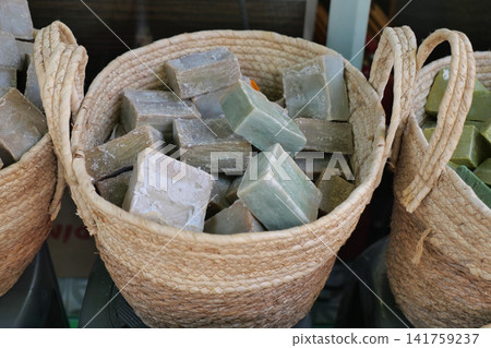 Handmade soap blocks in woven baskets on display Handmade soap blocks in woven baskets on display 141759237