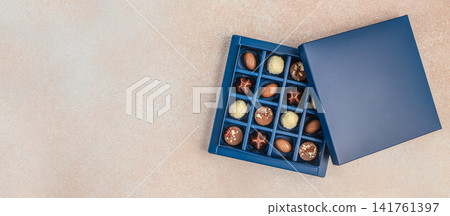 Luxury Assorted Chocolates in Blue Gift Box with Copy Space Top View Luxury Assorted Chocolates in Blue Gift Box with Copy Space Top View 141761397