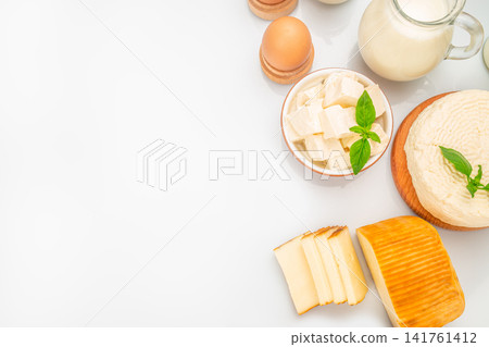 Dairy products and cheese assortment with copy space Dairy products and cheese assortment with copy space 141761412