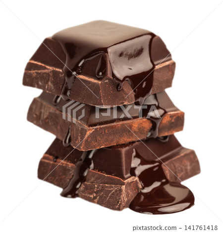 Stacked Dark Chocolate Pieces with Melted Chocolate Isolated on White Background Stacked Dark Chocolate Pieces with Melted Chocolate Isolated on White Background 141761418