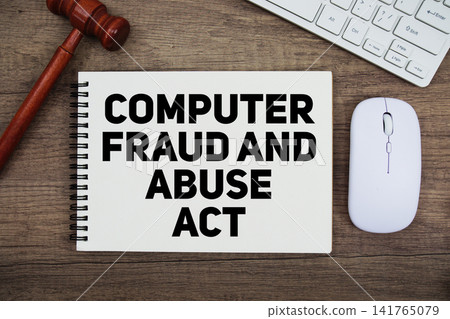 CFAA Computer Fraud and Abuse Act text written on notepad with gavel and keyboard on wooden background CFAA Computer Fraud and Abuse Act text written on notepad with gavel and keyboard on wooden background 141765079