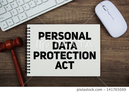 PDPA Personal Data Protection Act text written on notepad with gavel and keyboard on wooden background PDPA Personal Data Protection Act text written on notepad with gavel and keyboard on wooden background 141765089