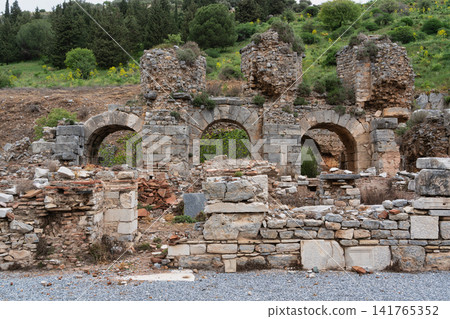 Ancient Roman ruins with stone arches and walls at Ephesus, Selcuk, Turkey Ancient Roman ruins with stone arches and walls at Ephesus, Selcuk, Turkey 141765352
