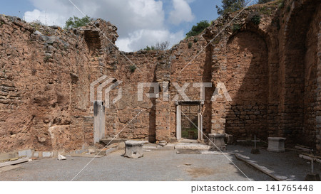 Ancient Roman ruins with weathered stone walls and doorway, Ephesus, Selcuk, Turkey Ancient Roman ruins with weathered stone walls and doorway, Ephesus, Selcuk, Turkey 141765448