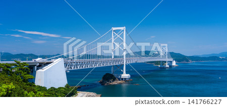 The Great Naruto Bridge is a massive suspension bridge spanning the Naruto Strait, connecting Naruto City in Tokushima Prefecture with Awaji Island. The Great Naruto Bridge is a massive suspension bridge spanning the Naruto Strait, connecting Naruto City in Tokushima Prefecture with Awaji Island. 141766227