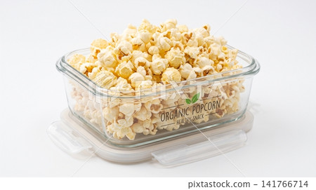 Clear glass container filled with freshly popped crunchy popcorn container background isolated appetizer transparent homemade delicious snacking vegetarian rectangular gathering cravings Clear glass container filled with freshly popped crunchy popcorn container background isolated appetizer transparent homemade delicious snacking vegetarian rectangular gathering cravings 141766714