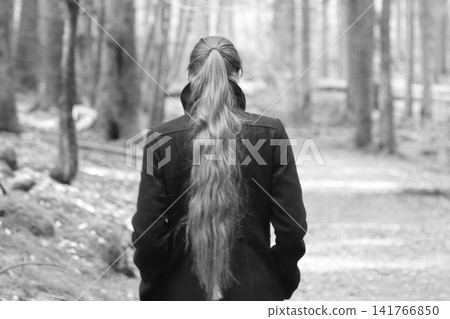 Young woman with long hair Young woman with long hair 141766850