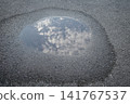 Puddles after the rain 141767537