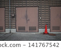 A building with a rusty door 141767542