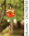 Wind chimes swaying in the wind 141768790