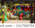 Wind chimes swaying in the wind 141768794