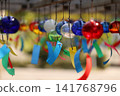 Wind chimes swaying in the wind 141768796