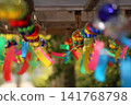 Wind chimes swaying in the wind 141768798