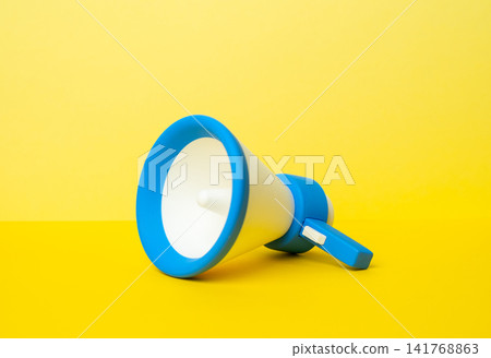 A blue megaphone on a yellow background. Agitation and propaganda. Advertising and business marketing. Bold promotion concept about public messaging, brand visibility, and persuasive outreach A blue megaphone on a yellow background. Agitation and propaganda. Advertising and business marketing. Bold promotion concept about public messaging, brand visibility, and persuasive outreach 141768863