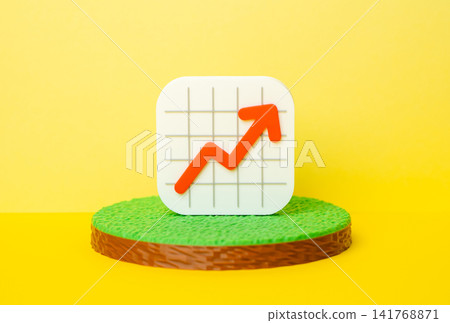 A rising graph on a plot of land. Rising land prices, increasing rental income. Land tax increases. A rising graph on a plot of land. Rising land prices, increasing rental income. Land tax increases. 141768871