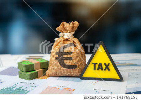 Symbol of attention to taxes and euro money bag. Tax payment period. Financial statements. Symbol of attention to taxes and euro money bag. Tax payment period. Financial statements. 141769153