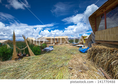 Totora boat on the Titicaca lake near Puno, Peru Totora boat on the Titicaca lake near Puno, Peru 141770488