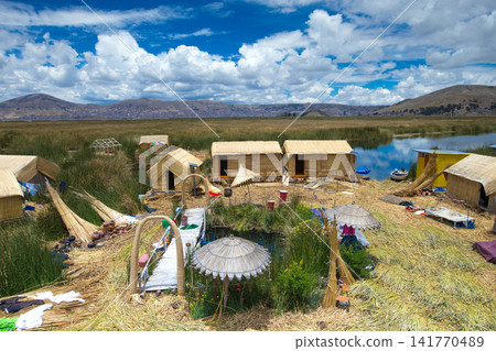 Totora boat on the Titicaca lake near Puno, Peru Totora boat on the Titicaca lake near Puno, Peru 141770489