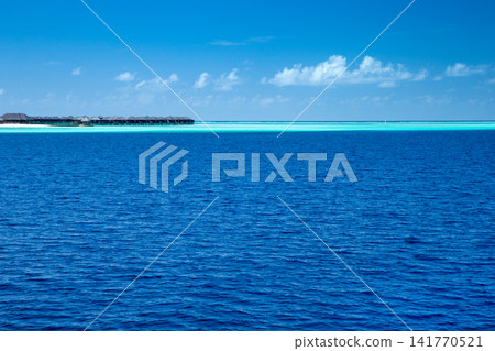 tropical Maldives island with white sandy beach and sea tropical Maldives island with white sandy beach and sea 141770521