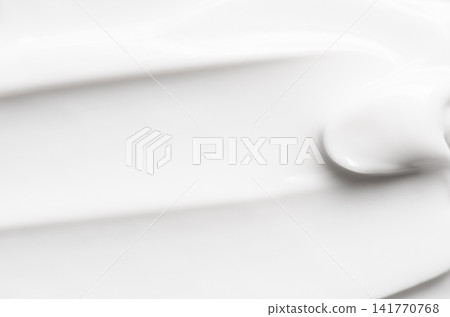 The white texture of cosmetic body cream. Copy space The white texture of cosmetic body cream. Copy space 141770768