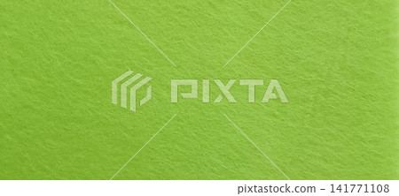 Vibrant lime green textured surface with soft fibrous pattern Vibrant lime green textured surface with soft fibrous pattern 141771108
