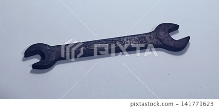 Vintage Double-Open-Ended Steel Wrench (Size 10-12 mm) on White Background Vintage Double-Open-Ended Steel Wrench (Size 10-12 mm) on White Background 141771623