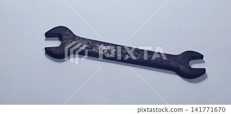 Vintage Double-Open-Ended Steel Wrench (Size 10-12 mm) on White Background Vintage Double-Open-Ended Steel Wrench (Size 10-12 mm) on White Background 141771670