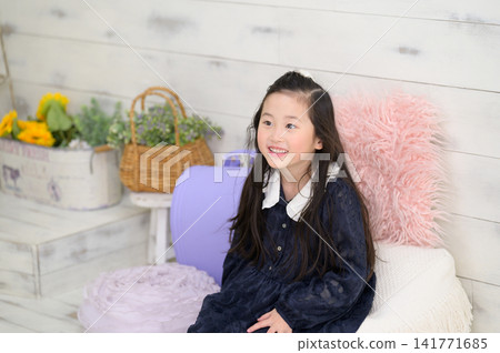 A Japanese girl practicing for her entrance exams. 141771685