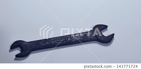 Vintage Double-Open-Ended Steel Wrench (Size 10-12 mm) on White Background Vintage Double-Open-Ended Steel Wrench (Size 10-12 mm) on White Background 141771724