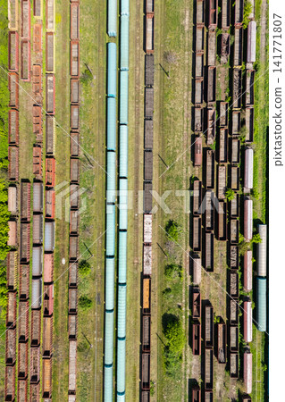 Aerial view of a railway transport hub with freight wagons 141771807
