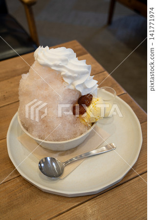 Summer: Shaved ice dessert topped with ice cream Summer: Shaved ice dessert topped with ice cream 141771974
