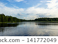Panoramic view of a rural lake near a forest in summer 141772049