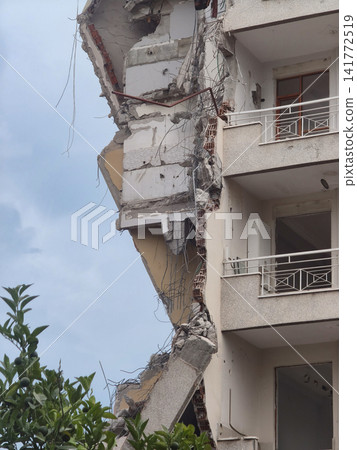 Damaged Building Showing Structural Destruction. Damaged Building Showing Structural Destruction. 141772519
