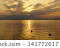 Golden sunset over the lake Sniardwy in Nowe Guty, Masuria, Poland 141772617