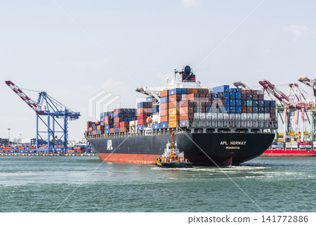 The container ship of APL Shipping is sailing into Kaohsiung Second Harbor, Taiwan. The container ship of APL Shipping is sailing into Kaohsiung Second Harbor, Taiwan. 141772886