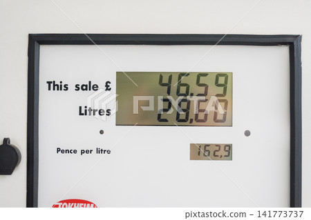 Corby, Northamptonshire, UK - August 2, 2026: Close-up of fuel pump display showing petrol cost and litres dispensed Corby, Northamptonshire, UK - August 2, 2026: Close-up of fuel pump display showing petrol cost and litres dispensed 141773737