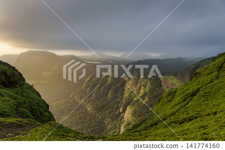 Green Mountain Valley Panorama with Storm Clouds and Sunlight Green Mountain Valley Panorama with Storm Clouds and Sunlight 141774160