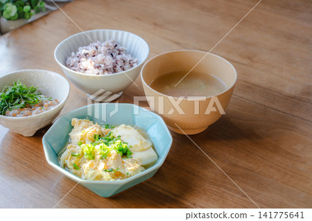 A healthy Japanese breakfast set served at the family dinner table. A healthy Japanese breakfast set served at the family dinner table. 141775641