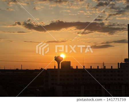 The sunrise over the water tower The sunrise over the water tower 141775739