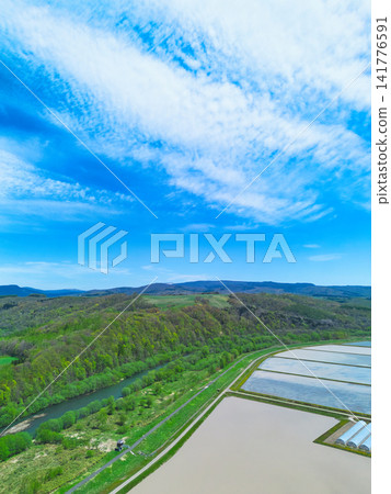 Aerial view of water reflection Aerial view of water reflection 141776591