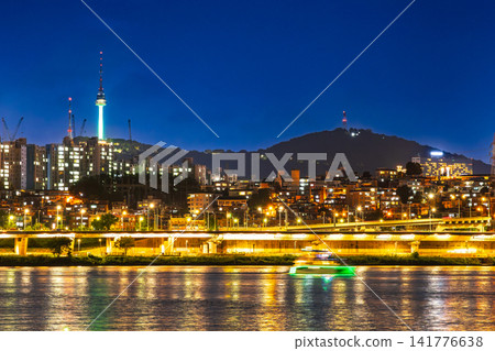 Seoul: The Han River at night and the illuminated Namsan Tower. Seoul: The Han River at night and the illuminated Namsan Tower. 141776638