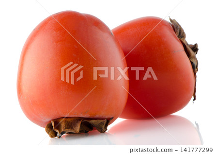 Red ripe persimmons Red ripe persimmons 141777299