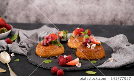 Caramel custard puddings 141777937