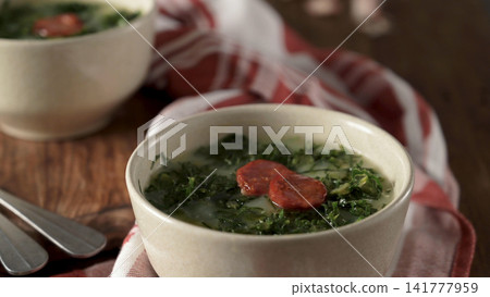 Traditional Portuguese Caldo Verde Soup with Chourico Traditional Portuguese Caldo Verde Soup with Chourico 141777959
