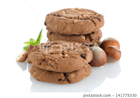 Chocolate cookies with mint leaves Chocolate cookies with mint leaves 141778330