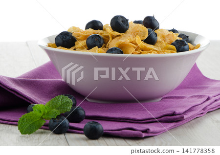 Cereal and blueberries Cereal and blueberries 141778358