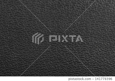 Black plastic surface Black plastic surface 141778396