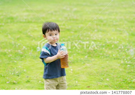 Boy hydrating Boy hydrating 141778807