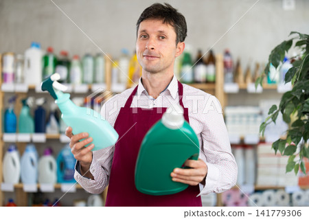 seller offers a set of products for cleaning surfaces seller offers a set of products for cleaning surfaces 141779306